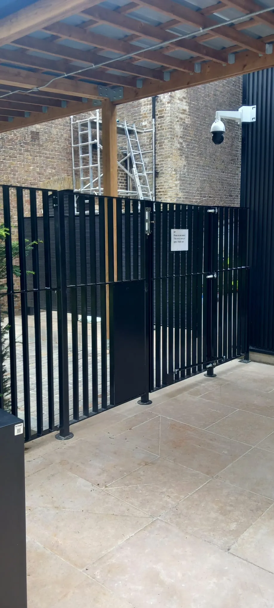 black steel pedestrian gate